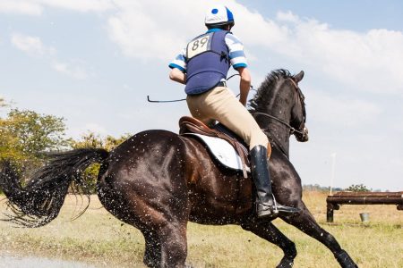 person horseback riding outdoors